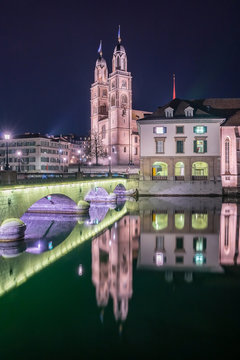 View of Grossmunster and Zurich old town from Limmat river. The Grossmunster is a Romanesque-style Protestant church in Zurich, Switzerland