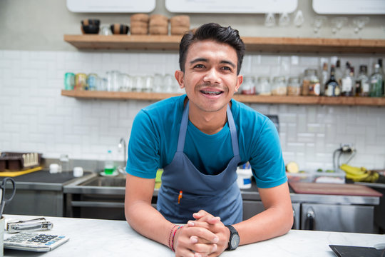 A barista at the counter