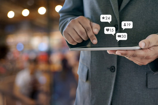 Contact us  sms media man use  smart phone social media network pop notification icons