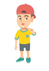 Caucasian little boy brushing his teeth. Happy boy cleaning his teeth. Cheerful boy in a cap holding toothbrush in hand. Vector sketch cartoon illustration isolated on white background.