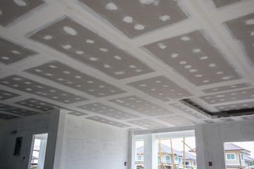 ceiling gypsum board installation at construction site