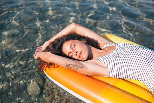 Woman enjoying the sea