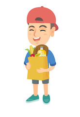 Little caucasian boy holding a paper shopping bag full of groceries. Full length of smiling boy standing with a grocery bag in hands. Vector sketch cartoon illustration isolated on white background.