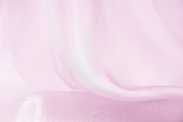 The texture of the satin fabric of lilac color for the background   