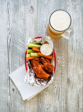 Wings:  Basket Of Hot Wings And A Cold Beer