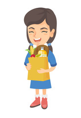 Little caucasian girl holding a paper shopping bag full of groceries. Full length of smiling girl standing with a grocery bag in hands. Vector sketch cartoon illustration isolated on white background.