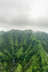 Aerial view on a overcast foggy day over Na Pali Coast in Kauai, Hawaii