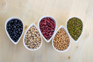 Healthy food concept, variety of colorful beans. Mung beans. black beans , soybean, red kidney , black eye pea.