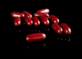 capsules on a black background