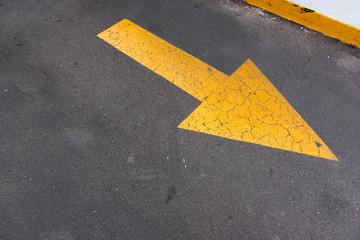 Yellow arrow on the road