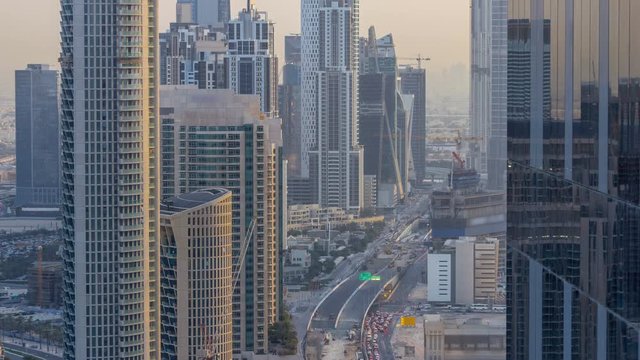 Dubai Downtown evening timelapse modern towers view from the top in Dubai, United Arab Emirates.