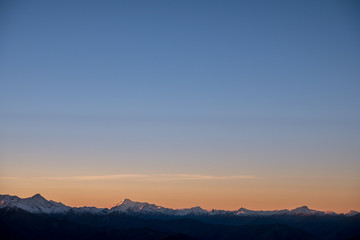 A stunning scene of sunset on the top of Alps mountain.