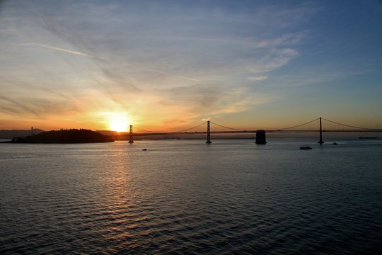 Sun rise over the Bay Bridge in San Francisco, California