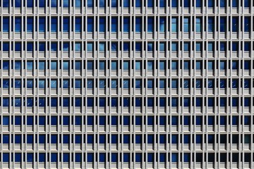 office building. innovation urban work place. modern repetitive pattern facade architecture. business and design background. energy efficient building