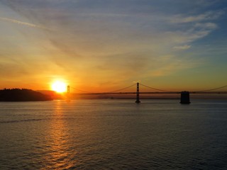 Naklejka na ściany i meble Bay Bridge in San Francisco, California at sunset