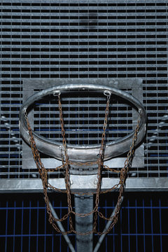 Basketball ring with rusty chain