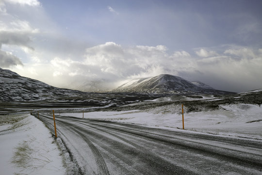 Ice and snow covered road in Iceland mountain region
