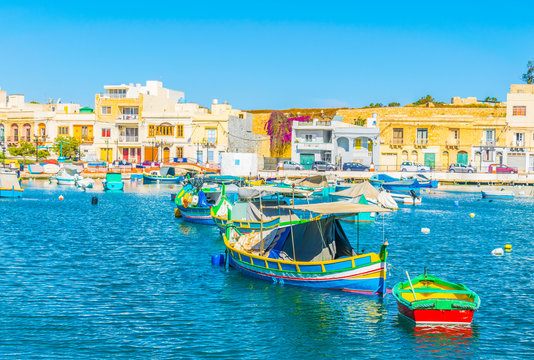 Fishing boats moor in Birzebbuga, Malta