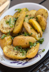  potatoes with herbs sprinkled with green parsley