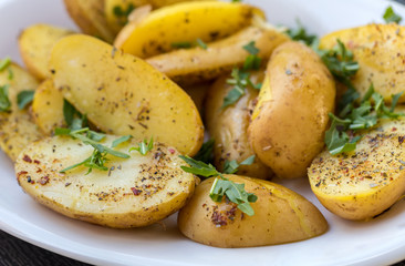  potatoes with herbs sprinkled with green parsley