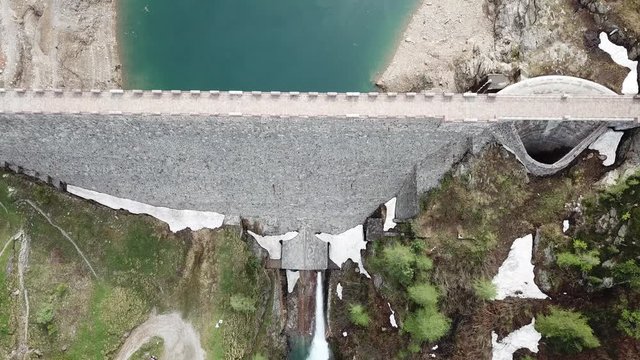 Drone aerial view of the Lake Fregabolgia and the dam, an Alpine artificial lake. Italian Alps. Italy