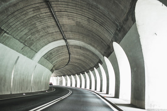 Fototapeta Driving through the Tunnel in Alps