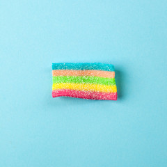 candies with jelly and sugar pattern. colorful array of different childs sweets and treats. Bright party background, minimal concept..