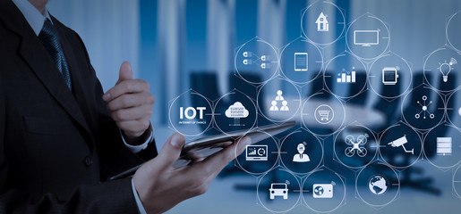 Internet of Things (IOT) technology with AR (Augmented Reality) on VR dashboard.Businessman working with digital tablet computer.