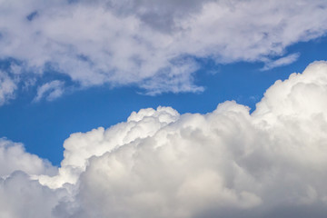 Obraz premium White clouds on a blue sky