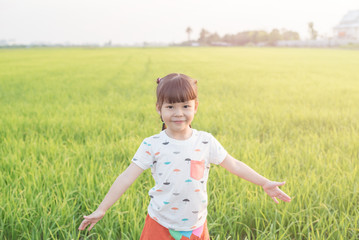 open arms little happy girl green meadow rice field