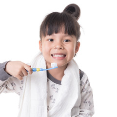 Little girl brushing her teeth isolated on white background
