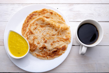 Roti canai or paratha with dhal