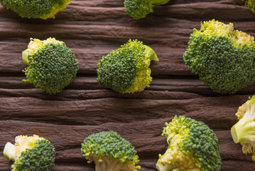Fresh green broccoli on wooden background