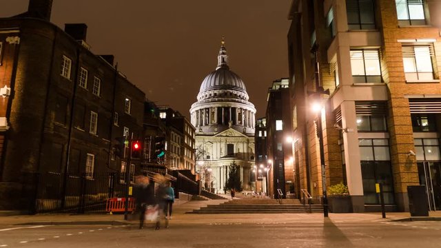 Traffic moves past St Pauls.
