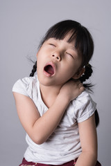 The girl has shoulder pain.