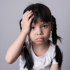 Ill girl having a headache