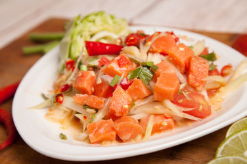 spicy papaya salad with fresh salmon - som tam thai food