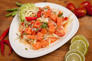 spicy papaya salad with fresh salmon - som tam thai food