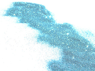 Obraz premium Blurred background with blue glitter sparkle on white, decoration, fashion, holidays