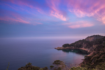 clifftop sunset over sea in spain