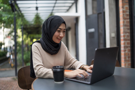 A Muslim Girl Is Doing Some Work