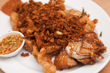 Fried fish and garlic thai style sauce - Thai food