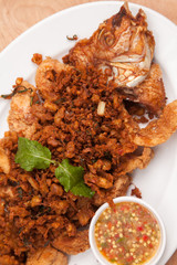 Fried fish and garlic thai style sauce - Thai food