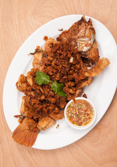 Fried fish and garlic thai style sauce - Thai food