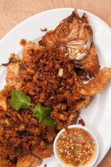 Fried fish and garlic thai style sauce - Thai food