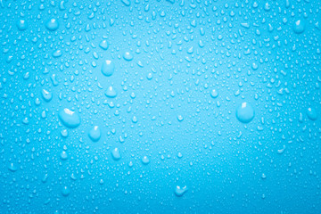 Water drops on blue background
