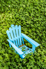 Teal Beach Chair in a Bush - House Decor