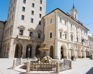 Tourist view of Rieti, in Lazio, Italy. The Town Hall and Fountain of the dolphins. - obrazy, fototapety, plakaty