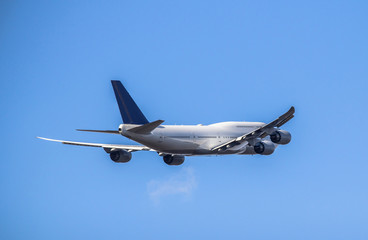 Fototapeta na wymiar Passanger airplane taking off