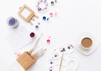 Art workspace for designer and artists. Flat lay with brushes and paint. Minimal concept